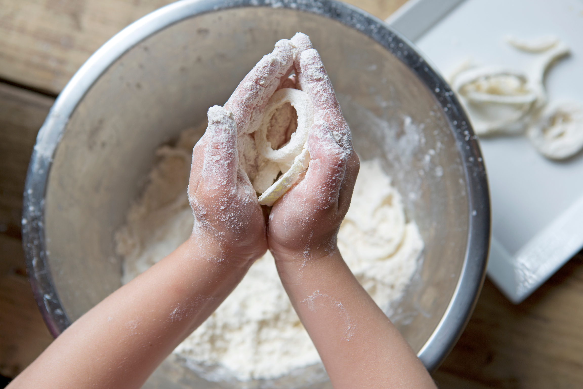 kids hands cooking